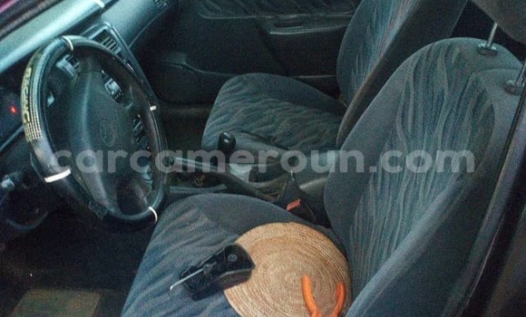 Sayi Na hannu Toyota Carina E Red Mota in Garoua a North Kamaru Sayi Na hannu Toyota Carina E Red Mota in Garoua a North Kamaru