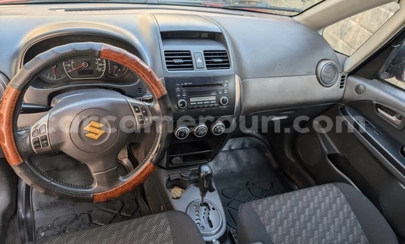 Sayi Na hannu Suzuki Swift Red Mota in Douala a Ƙasar Kamaru Sayi Na hannu Suzuki Swift Red Mota in Douala a Ƙasar Kamaru