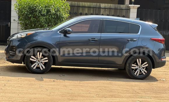 Sayi Na hannu Kia Sportage Blue Mota in Douala a Ƙasar Kamaru Sayi Na hannu Kia Sportage Blue Mota in Douala a Ƙasar Kamaru