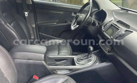 Sayi Imported Kia Sportage White Mota in Douala a Ƙasar Kamaru Sayi Imported Kia Sportage White Mota in Douala a Ƙasar Kamaru