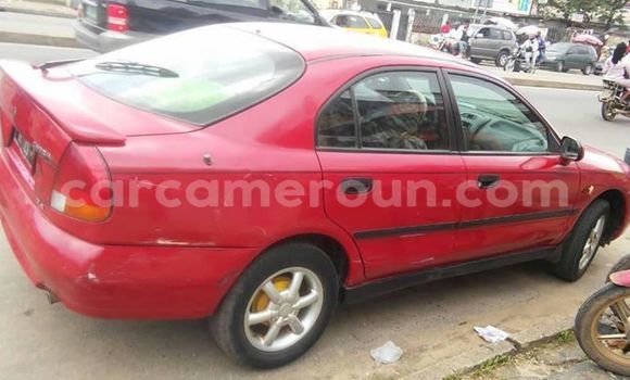 Sayi Na hannu Mitsubishi Carisma Red Mota in Douala a Ƙasar Kamaru