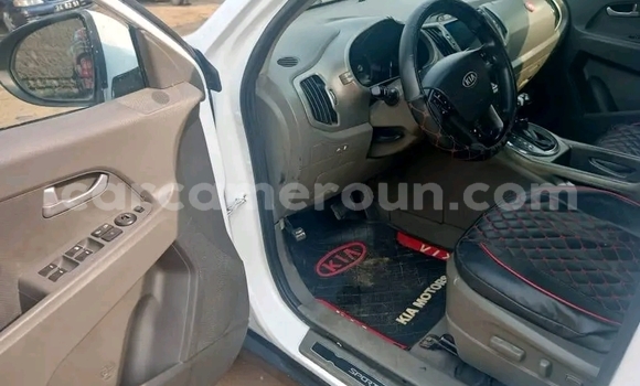 Sayi Na hannu Kia Sportage White Mota in Douala a Ƙasar Kamaru Sayi Na hannu Kia Sportage White Mota in Douala a Ƙasar Kamaru