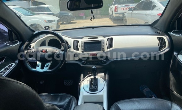 Sayi Imported Kia Sportage White Mota in Douala a Ƙasar Kamaru Sayi Imported Kia Sportage White Mota in Douala a Ƙasar Kamaru