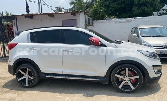 Sayi Imported Kia Sportage White Mota in Douala a Ƙasar Kamaru Sayi Imported Kia Sportage White Mota in Douala a Ƙasar Kamaru