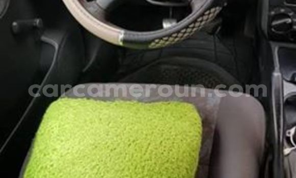 Buy Import Toyota Carina Red Car in Yaounde in Central Cameroon Buy Import Toyota Carina Red Car in Yaounde in Central Cameroon