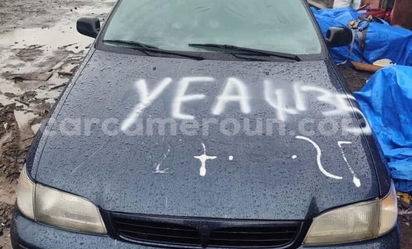 Sayi Imported Toyota Carina E White Mota in Douala a Ƙasar Kamaru Sayi Imported Toyota Carina E White Mota in Douala a Ƙasar Kamaru