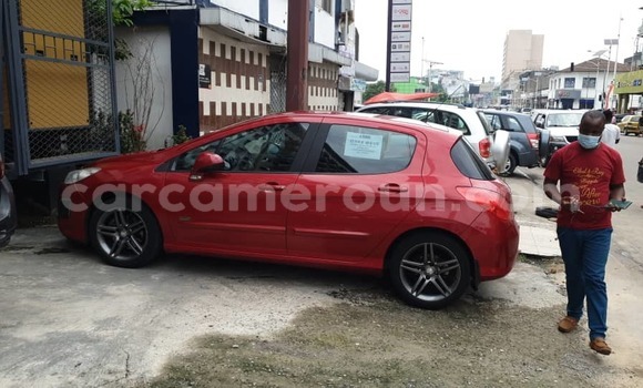 Sayi Imported Peugeot 308 Red Mota in Douala a Ƙasar Kamaru Sayi Imported Peugeot 308 Red Mota in Douala a Ƙasar Kamaru