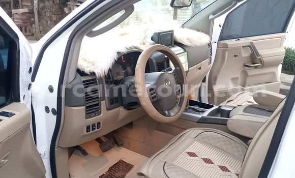 Sayi Na hannu Nissan Armada White Mota in Douala a Ƙasar Kamaru Sayi Na hannu Nissan Armada White Mota in Douala a Ƙasar Kamaru