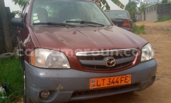 Sayi Na hannu Mazda Tribute Red Mota in Douala a Ƙasar Kamaru