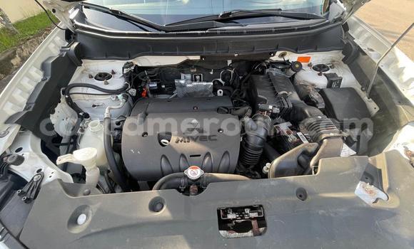 Sayi Imported Mitsubishi RVR White Mota in Douala a Ƙasar Kamaru Sayi Imported Mitsubishi RVR White Mota in Douala a Ƙasar Kamaru