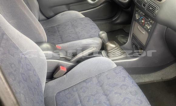 Sayi Imported Toyota Corolla Red Mota in Douala a Ƙasar Kamaru Sayi Imported Toyota Corolla Red Mota in Douala a Ƙasar Kamaru