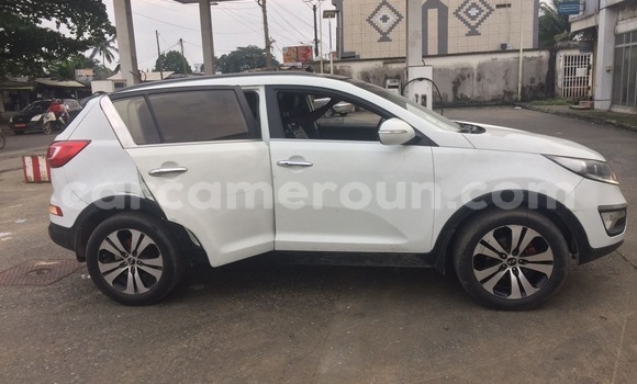 Sayi Imported Kia Sportage White Mota in Douala a Ƙasar Kamaru Sayi Imported Kia Sportage White Mota in Douala a Ƙasar Kamaru