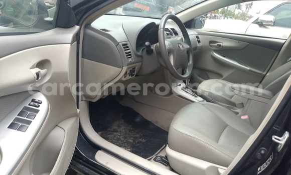 Sayi Imported Toyota Corolla Black Mota in Douala a Ƙasar Kamaru Sayi Imported Toyota Corolla Black Mota in Douala a Ƙasar Kamaru
